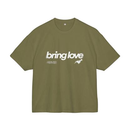 Green t-shirt with 'bring love' text on a white background